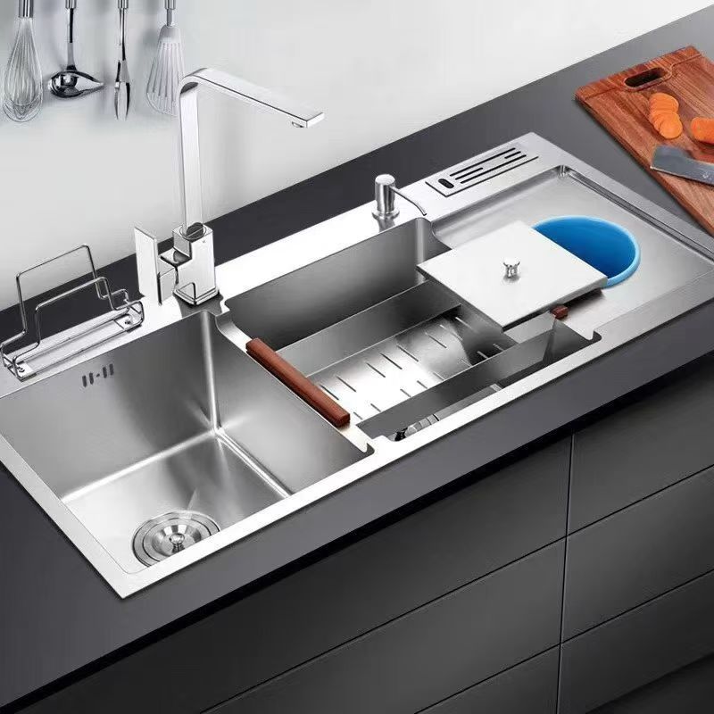 Stainless-steel workstation with integrated preparation accessories